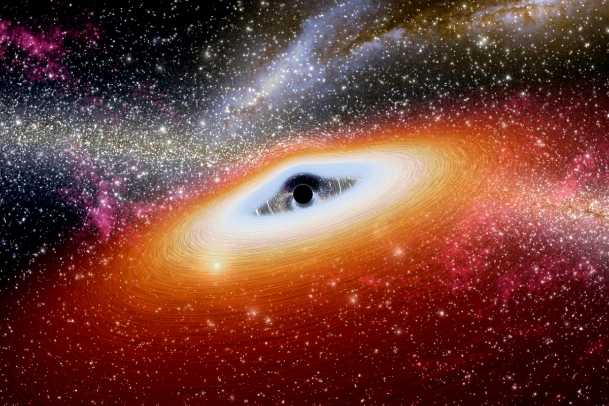 Wizja artystyczna supermasywnej czarnej dziury akreującej gaz i świecącej w dysku akrecyjnym.