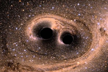 Symulacja łączących się czarnych dziur.