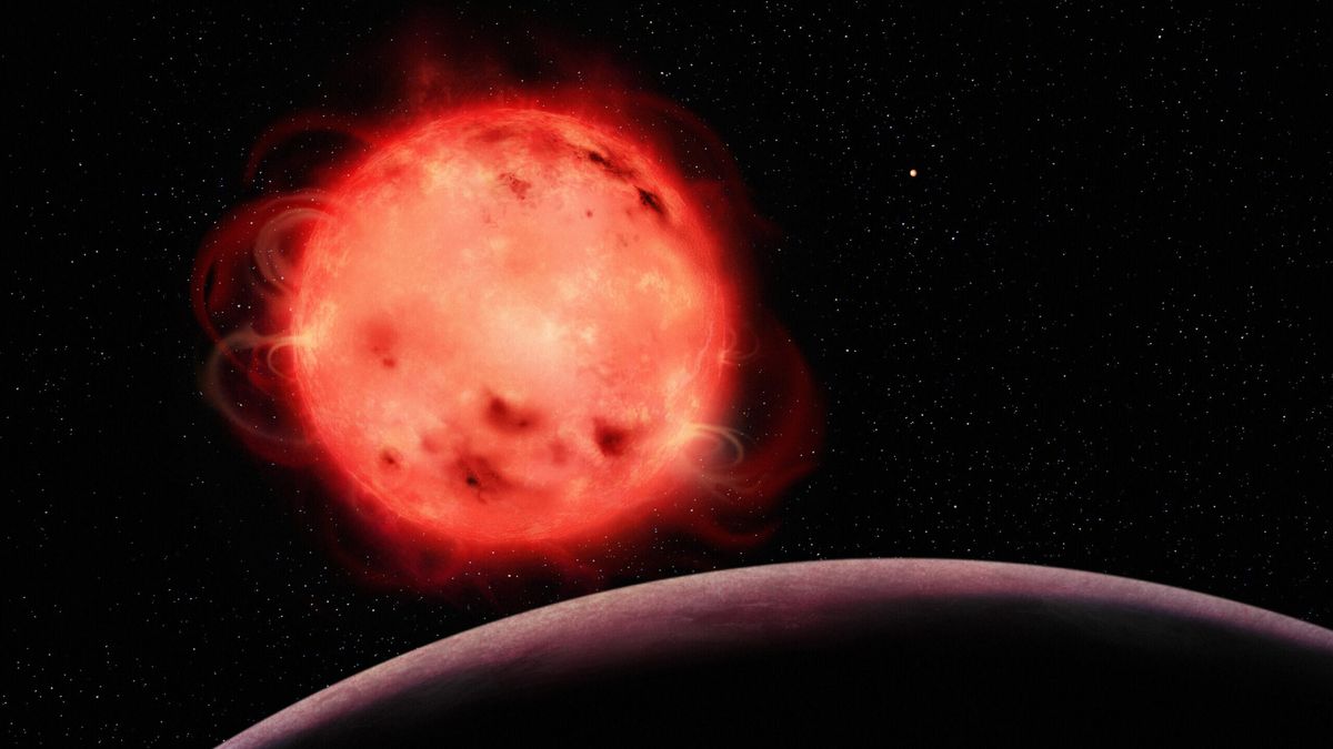 Artystyczne wyobrażenie czerwonego karła TRAPPIST-1 i planety TRAPPIST-1 b na pierwszym planie. (Benoît Gougeon, Université de Montréal)