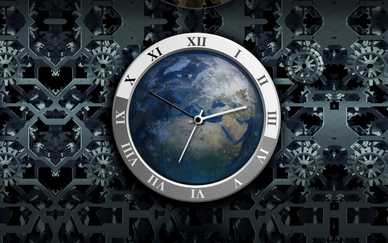 Symboliczna tarcza zegara z mapą Ziemi