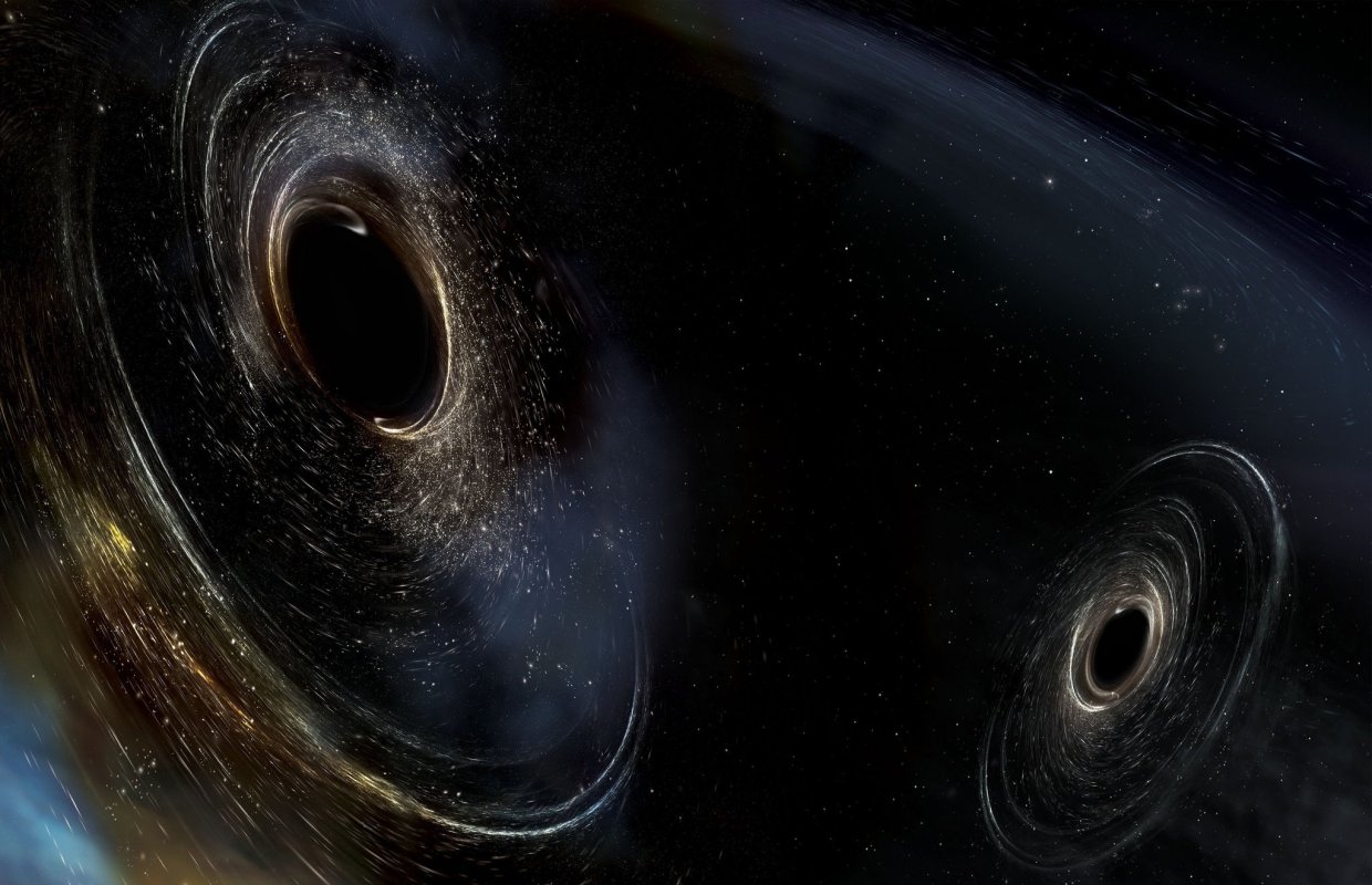 Wizja artystyczna przedstawiająca zderzenie się dwóch czarnych dziur o niewyrównanych orbitach.