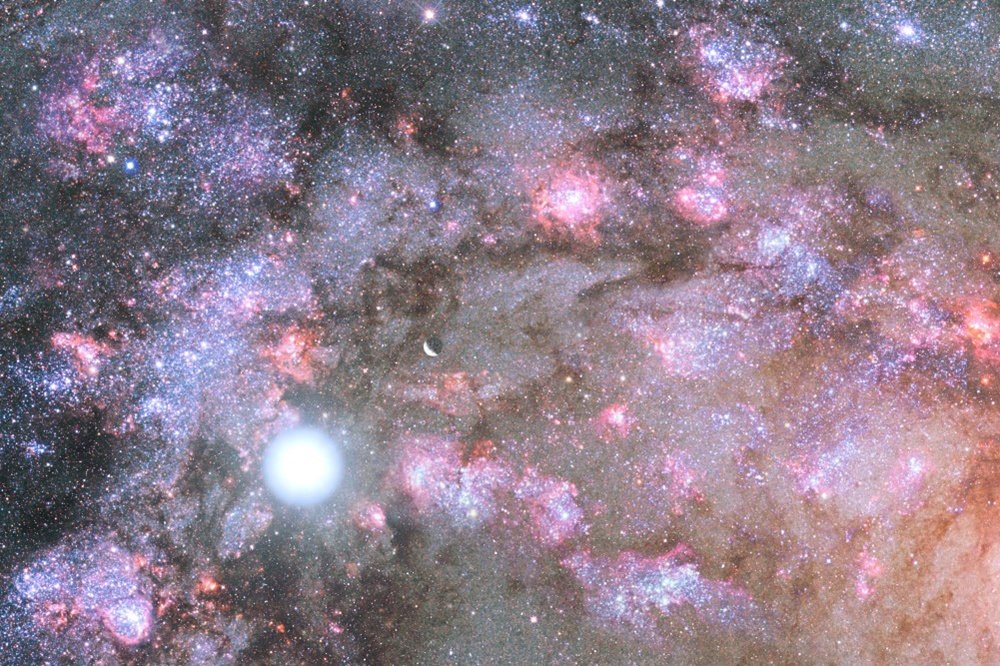  Artystyczna wizja burzliwych narodzin gwiazd zachodzących głęboko wewnątrz jądra młodej, dopiero rosnącej galaktyki eliptycznej.