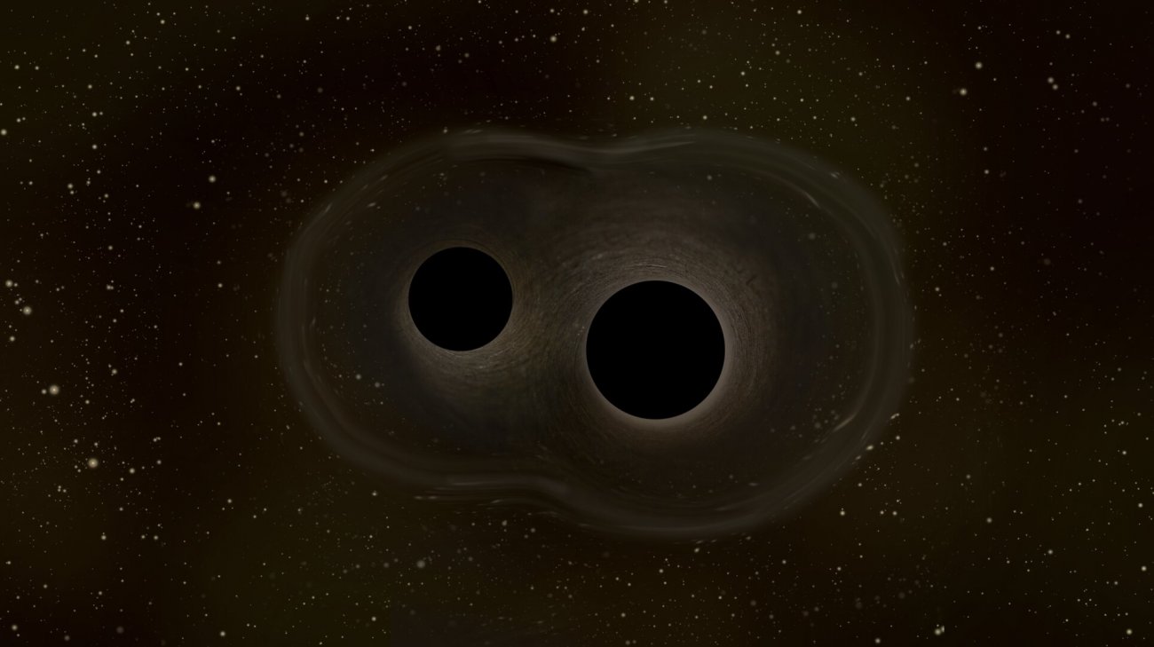 Wizja artystyczna dwóch łączących się czarnych dziur.