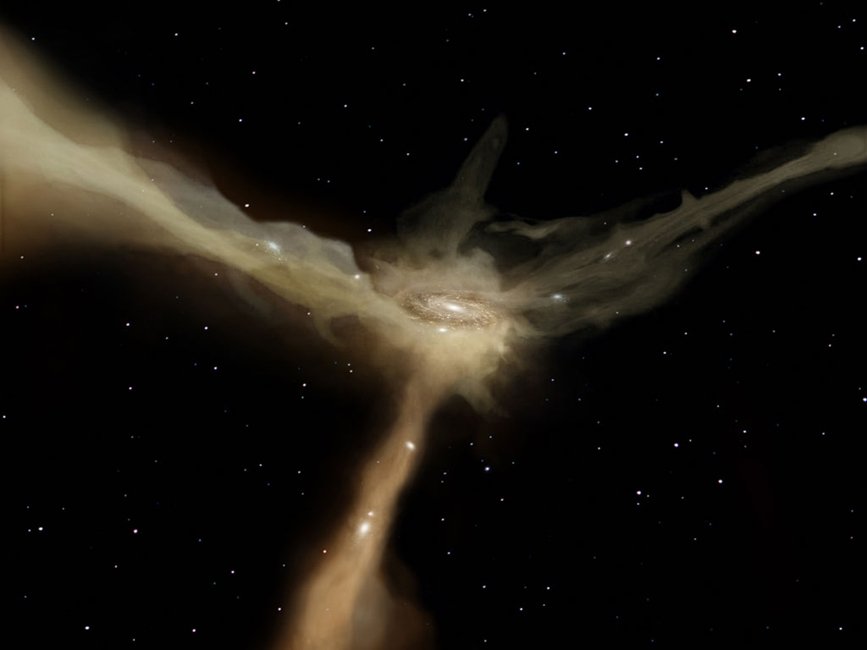 Galaktyka akreuje masę poprzez szybkie i wąskie strugi materii. Te filamenty stale dostarczają do galaktyki surowiec potrzebny do formowania nowych gwiazd. Ten model teoretyczny został zaproponowany na podstawie symulacji numerycznych wykonany przez Dekel i in. w 2009 roku (Nature, 457, 451D). Dotychczas tego rodzaju zjawisko strug materii nie zostało bezpośrednio zaobserwowane i nadal pozostaje w sferze domysłów. Źródło: ESA–AOES Medialab 