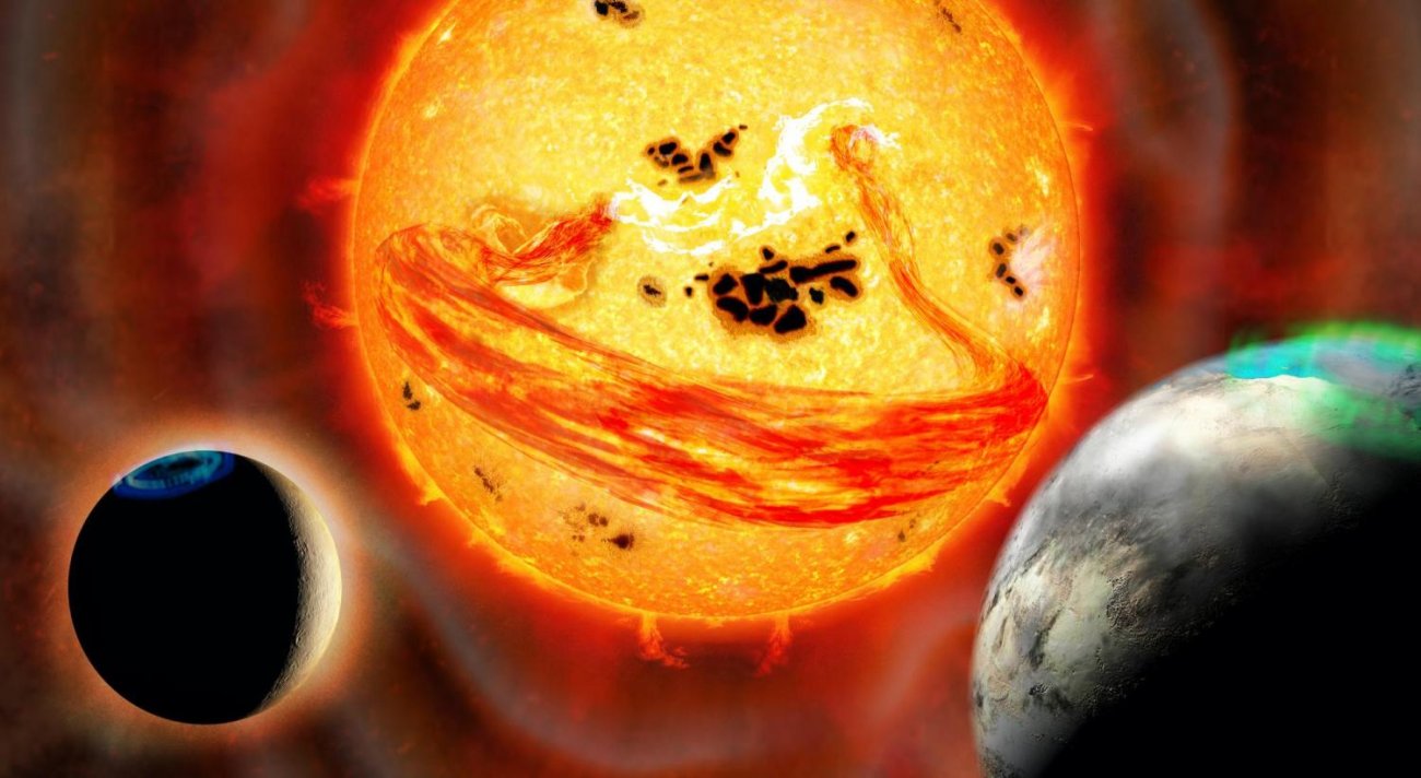 Na ilustracji: wizja artystyczna młodej gwiazdy podobnej do Słońca EK Draconis podczas koronalnego wyrzutu masy w stronę dwóch orbitujących wokół tej gwiazdy planet. Źródło: National Astronomical Observatory of Japan