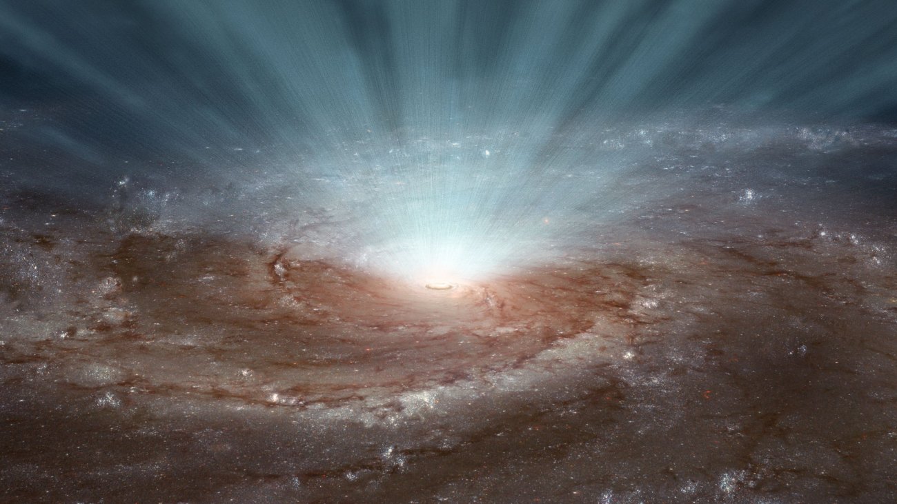Na ilustracji: Wizja artystyczna supermasywnej czarnej dziury w centrum galaktyki, która napędza wypływy gazu. Źródło: NASA/JPL-Caltech.