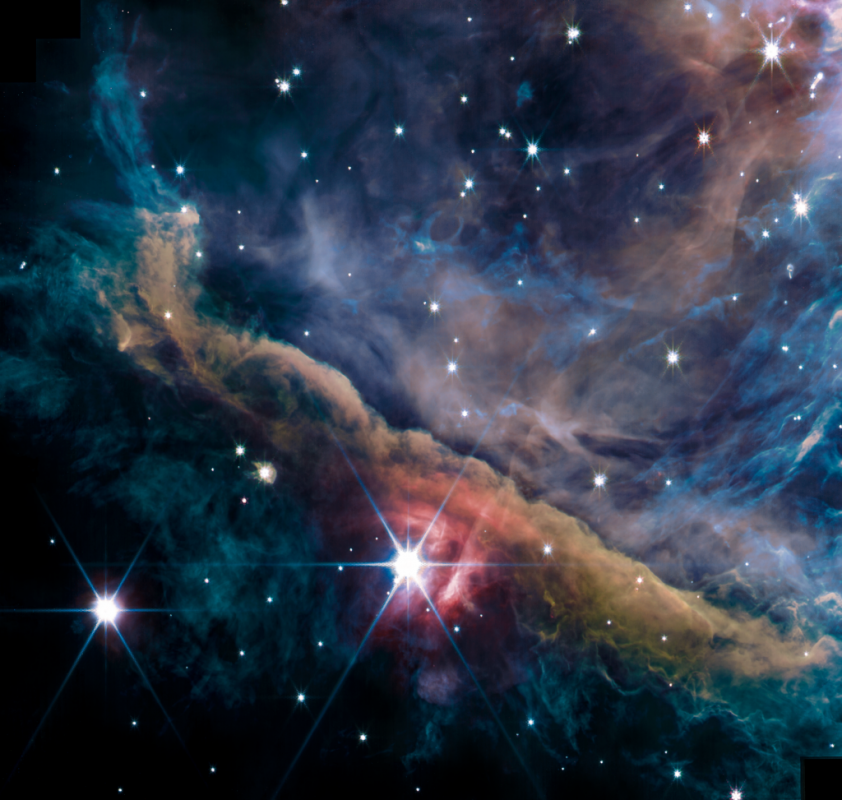 Na ilustracji: obraz centralnej części Mgławicy Oriona uzyskany w dniu 11 września 2022 r. za pomocą Kosmicznego Teleskopu Jamesa Webba (instrument NIRCam). Na ten połączony obraz składają się zdjęcia w następujących filtrach (w nawiasach podano kolor mapowania filtra/ów): F140M i F210M (niebieski); F277W, F300M, F323N, F335M i F332W (zielony), F405N (pomarańczowy), F444W, F480M i F470N (czerwony). Źródło: NASA / ESA / CSA, Data reduction and analysis: PDRs4All ERS Team Graphical processing: S. Fuenmayor