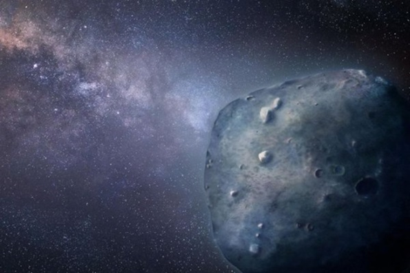 Wizja artystyczna Phaethona – asteroidy, która wydaje się odpowiadać za maksimum roju Geminidów. Źródło: Heather Roper/University of Arizona.