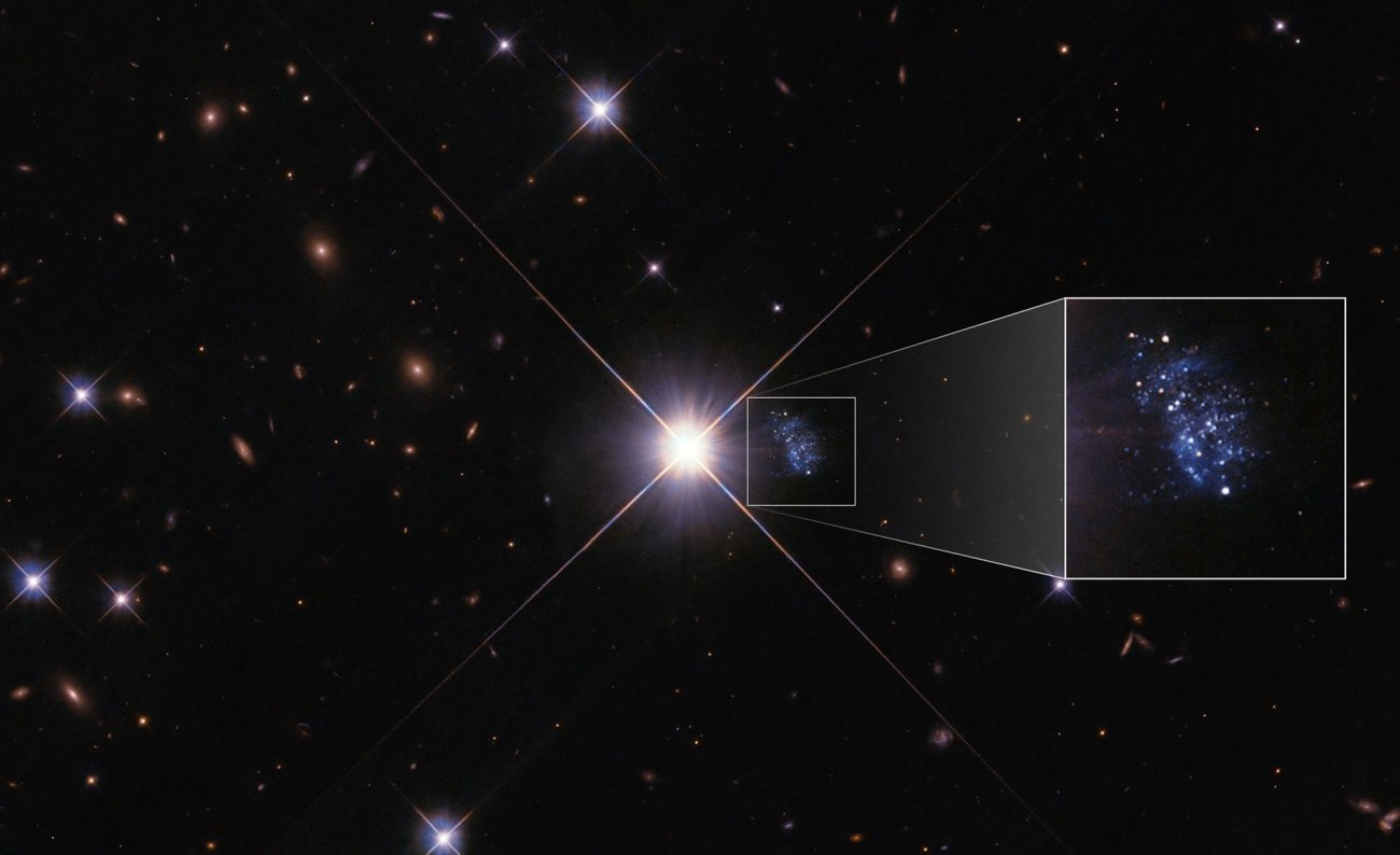 HST uchwycił maleńką galaktykę HIPASS J1131-31, zwaną Galaktyką Peekaboo, pomimo jej bliskości do jasnej gwiazdy pierwszego planu.