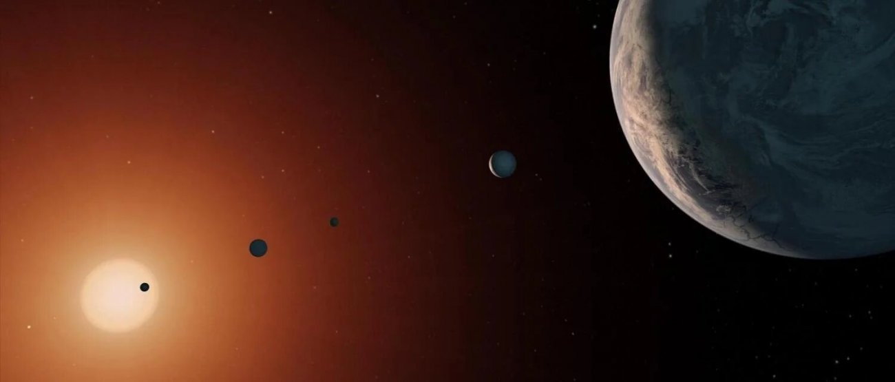 Artystyczne zobrazowanie układu TRAPPIST-1. Źródło: NASA/JPL-Caltec