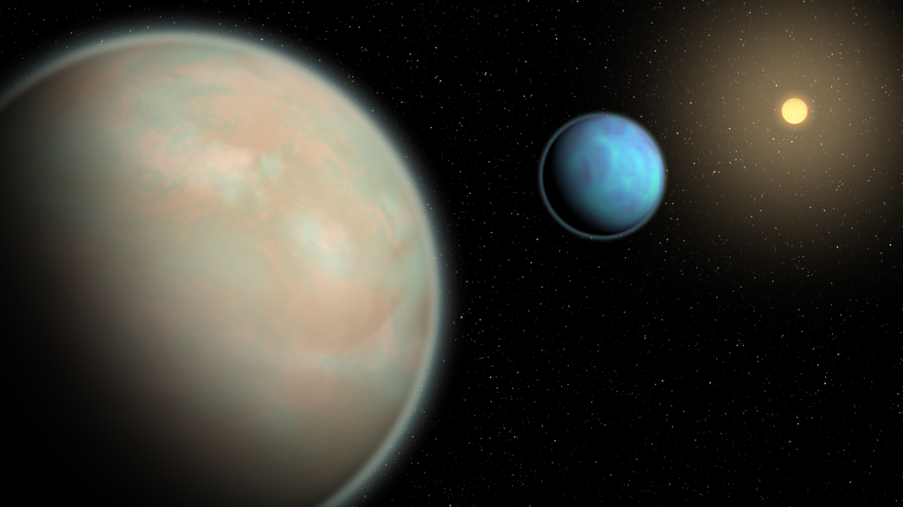 Dwie bogate w wodę egzoplanety z ciężkimi warstwami mgły krążą wokół swojej gwiazdy macierzystej.