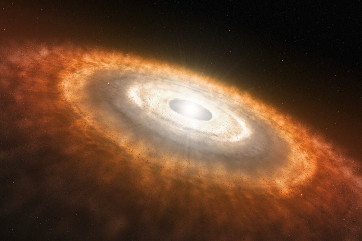 Na zdjęciu: Ilustracja młodej gwiazdy otoczonej dyskiem protoplanetarnym, w którym formują się planety. Źródło: ESO/L. Calçada