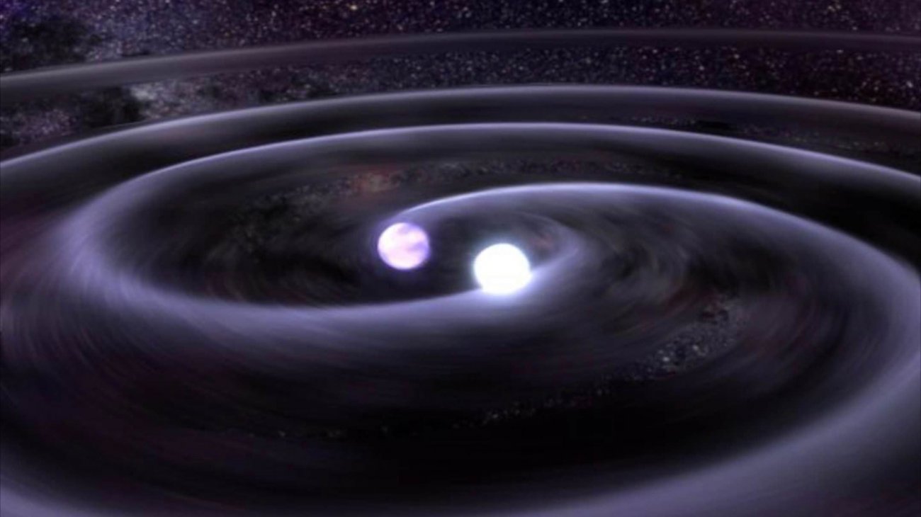 Wizja artystyczna układu podwójnego gwiazd neutronowych.