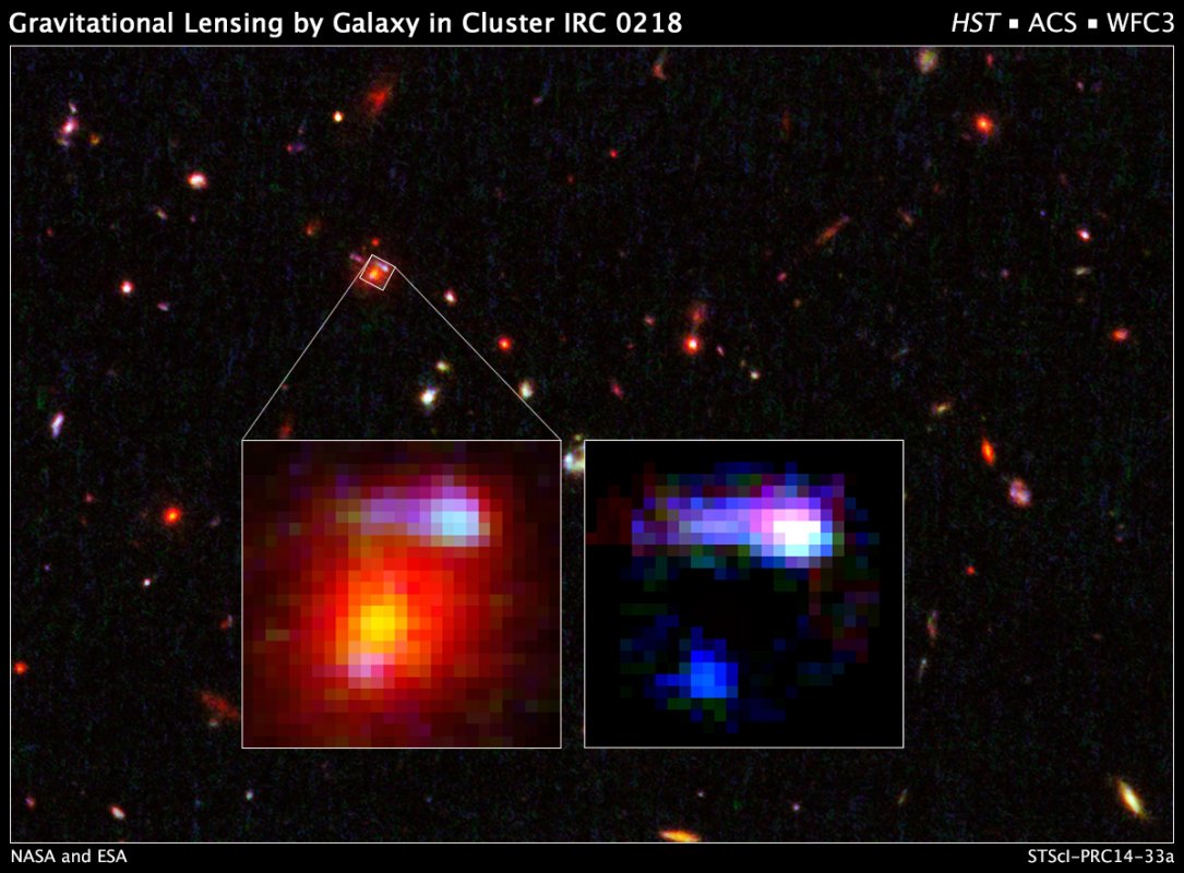 Soczewka grawitacyjna z gromady galaktyk IRC 0218