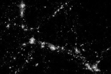 Projekcja materii gwiazdowej w regionie wielkości 50 Mpc w symulacji IllustrisTNG100