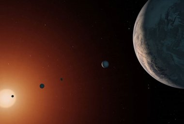 Wizja artystyczna dotycząca tego, jak mógłby wyglądać układ słoneczny TRAPPIST-1.