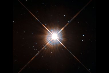 Na zdjęciu: Gwiazda Proxima Centauri, najbliższa sąsiadka Słońca, znajduje się w odległości około 4,25 lat świetlnych stąd. Źródło: ESA/Hubble & NASA