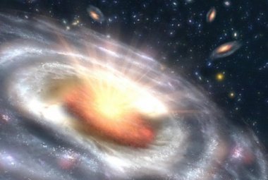 Na zdjęciu: Rosnące, masywne czarne dziury zwane kwazarami są obserwowane w centrach odległych galaktyk. Źródło: NASA/Caltech