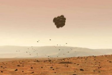 Rysunek wyobrażający jak wyposażony w poduszki powietrzne Spirit opada na czerwona planetę. Taka samą ochronę zastosowano 7 lat temu w misji Pathfinder. Źródło: NASA