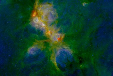 Mgławica NGC 6334, 5,5 tys. lat świetlnych od Ziemi. Kolor czerwony reprezentuje obserwacje Herschela na linii 70 mikrometrów (podczerwień), kolor zielony to dane z IRAC na 8 mikrometrach, a kolorem niebieskim zaznaczono dane z NEWFIRM (1 mikrometr). Obszar ten ma szerokość około 70 lat świetlnych. Źródło : S. Willis (CfA+ISU); ESA/Herschel; NASA/JPL-Caltech/ Spitzer; CTIO/NOAO/AURA/NSF