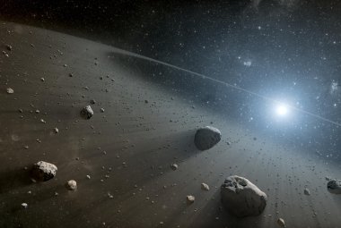 Artystyczna wizja pasa planetoid wokół Wegi. Źródło: NASA/JPL-Caltech.