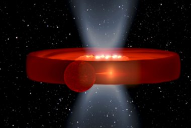 Klatka animacji ukazująca karła typu M w momencie zasilania gazem grubego dysku wokół niewidocznej czarnej dziury. W wewnętrznej części dysku uformowała się struktura w kształcie pączka z dziurką. Przesłania ona światło położonych w samym środku układu obszarów. Źródło: Gabriel Perez Diaz / IAC