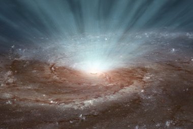 Na ilustracji: Wizja artystyczna supermasywnej czarnej dziury w centrum galaktyki, która napędza wypływy gazu. Źródło: NASA/JPL-Caltech.