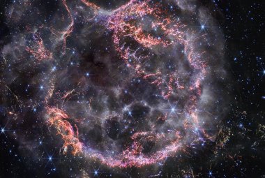 A new near-infrared image from NASA’s James Webb Space Telescope’s NIRCam of the supernova remnant Cassiopeia A. In the bottom right corner is a light echo , created by light from the star’s long-ago explosion off surrounding dust. (NASA / ESA / CSA / STScI / Danny Milisavljevic (Purdue University) / Ilse De Looze (UGent) / Tea Temim (Princeton University))