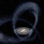 Wizja artystyczna przedstawiająca galaktykę karłowatą Strzelca zbliżającą się do Drogi Mlecznej.